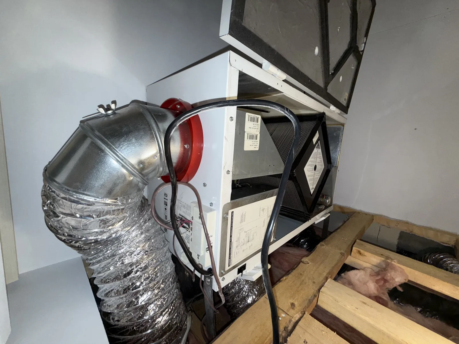 Clean residential air exchanger installed in a basement